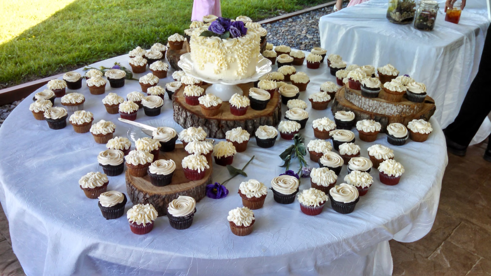 Custom cupcake and cake dessert table by Anne's Catering